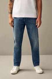 Blue Mid Tint Regular Fit Vintage Stretch Authentic Jeans - Image 1 of 10