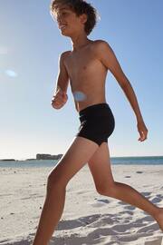 Black Shorter Length Stretch Swim Shorts (3-16yrs) - Image 1 of 5