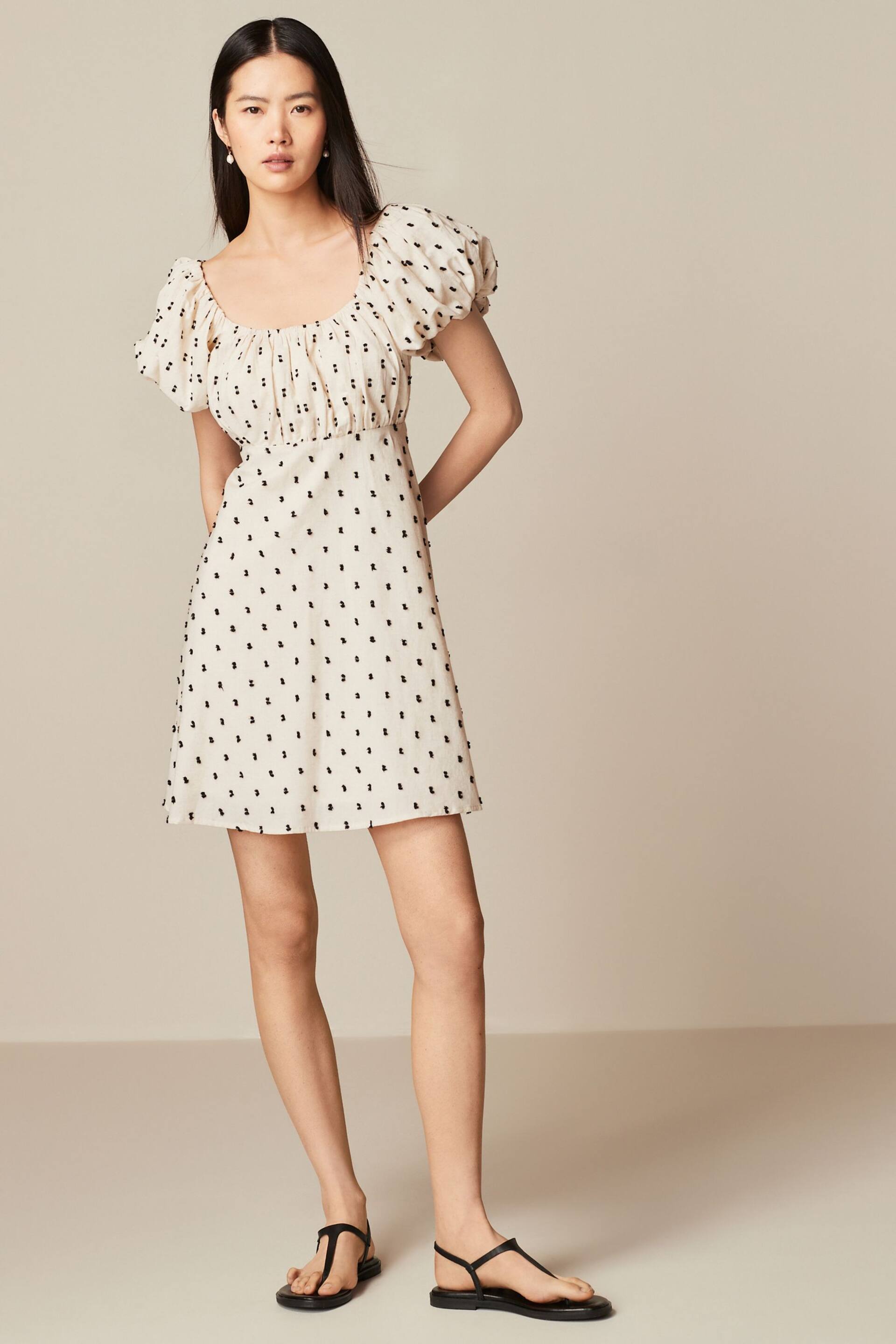 Neutral/Black Polka Dot Mini Puff Sleeve Ruched Front Dress - Image 1 of 6