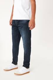 Blue ink Tapered Fit Cotton Rich Stretch Jeans (3-17yrs) - Image 1 of 3