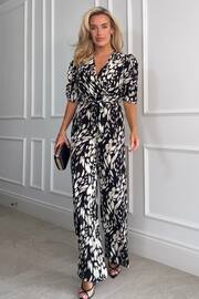 Girl In Mind Black/Cream Spot Petite Fizz Puff Sleeve Wide Leg Jumpsuit - Image 1 of 4