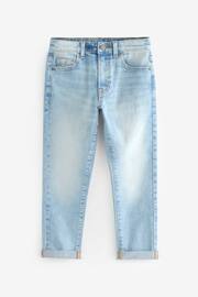 Blue Bleach Tapered Fit Cotton Rich Stretch Jeans (3-17yrs) - Image 1 of 3