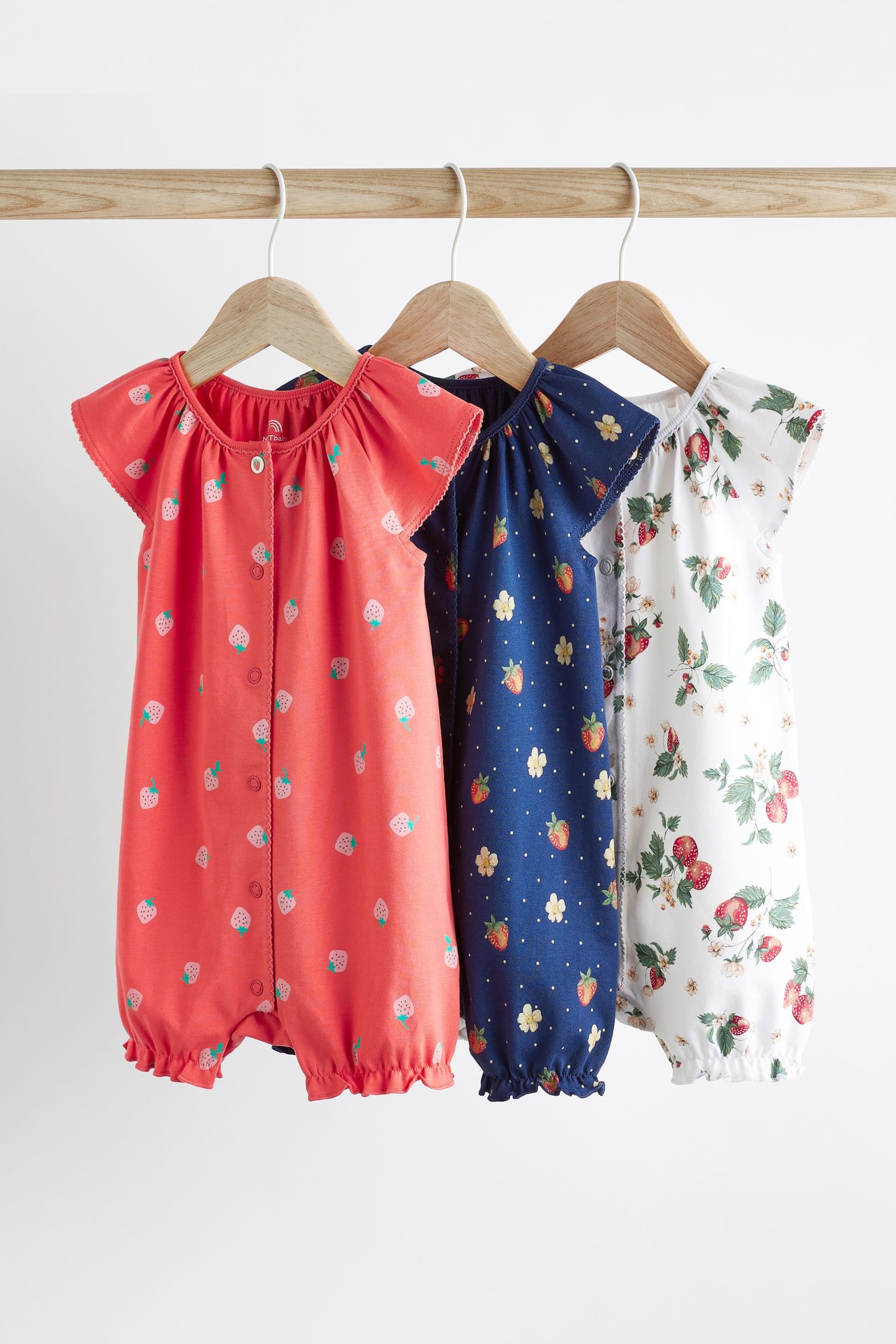 White/Blue/Red Strawberry Baby Rompers 3 Pack - Image 1 of 9