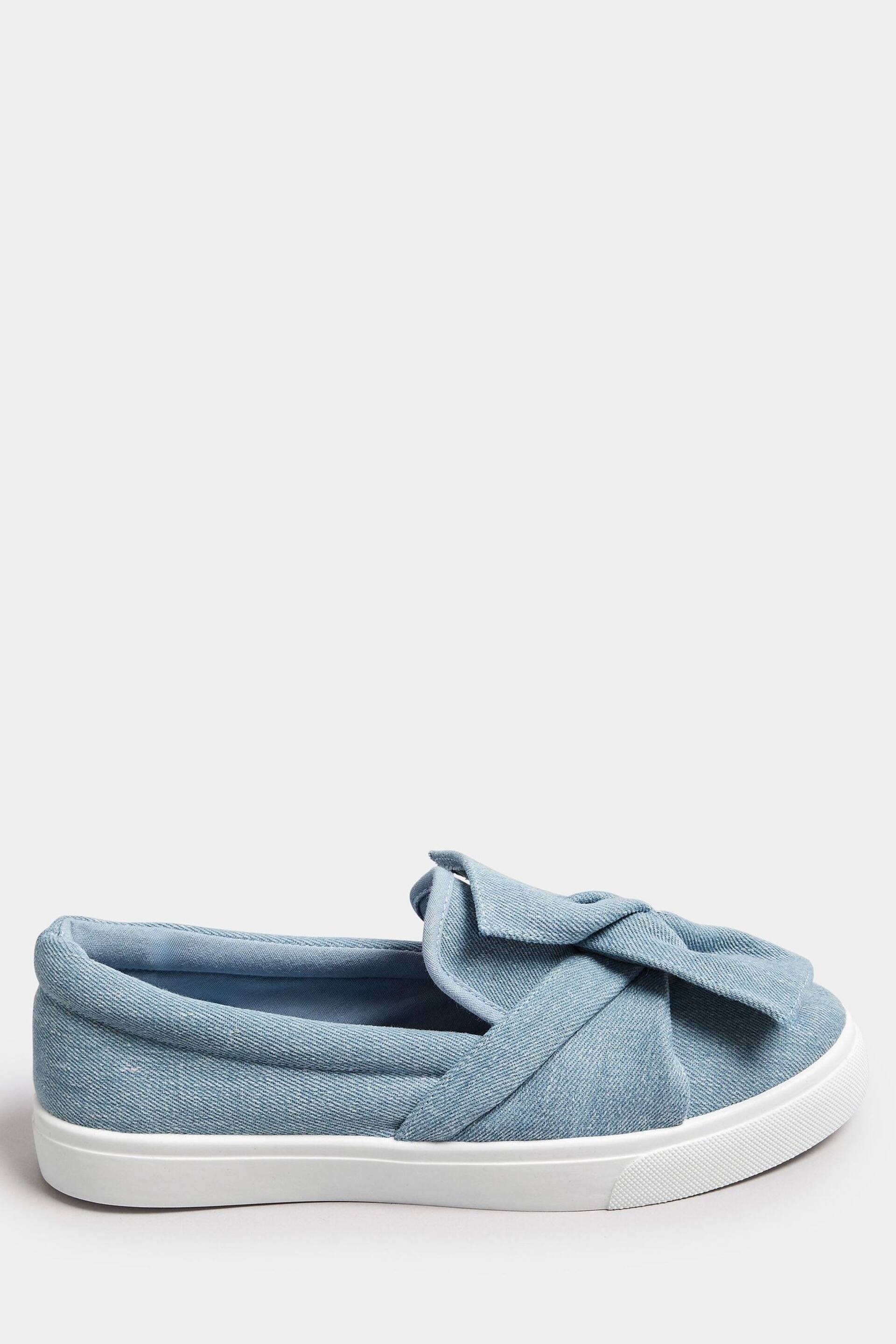 Yours Curve Blue Denim Twisted Bow Slip-On Trainers In Wide E Fit - Image 1 of 4