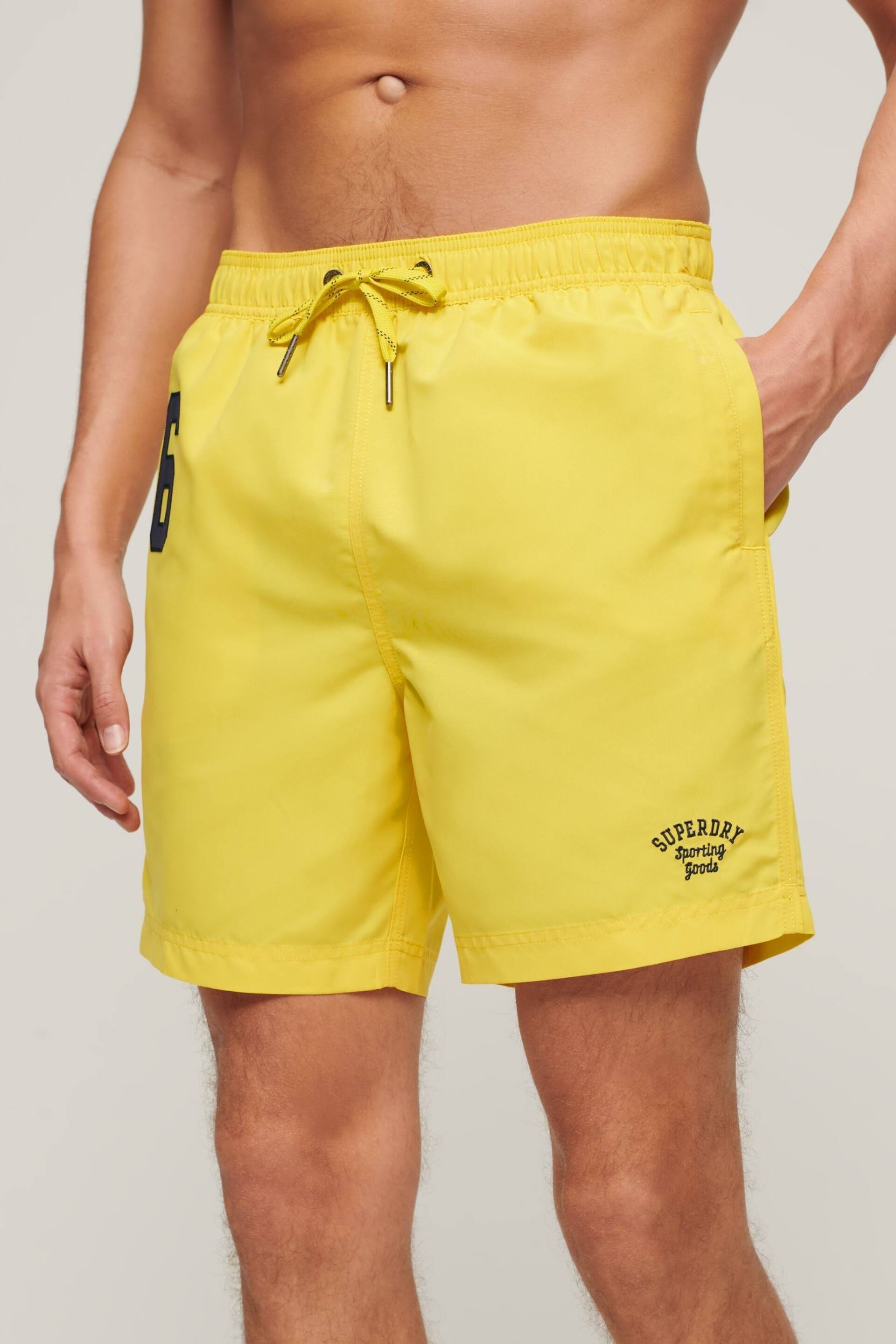 Superdry Yellow Recycled Polo 17 Inch Swim Shorts - Image 1 of 4