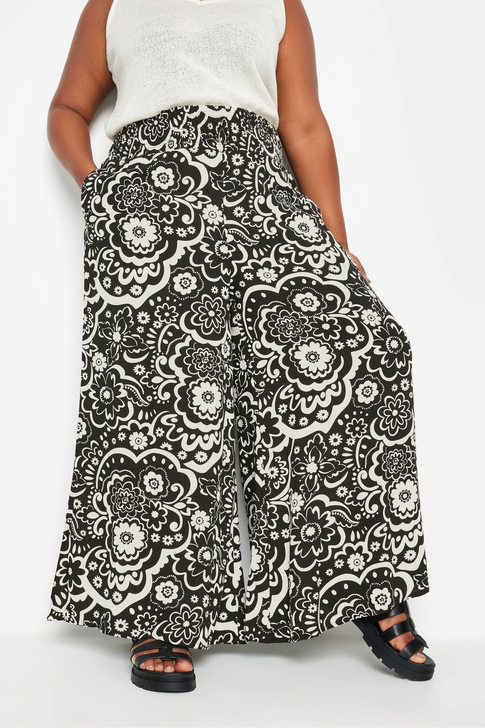 Yours Curve Black Floral Print Shirred Wide Leg Trousers - Image 1 of 5