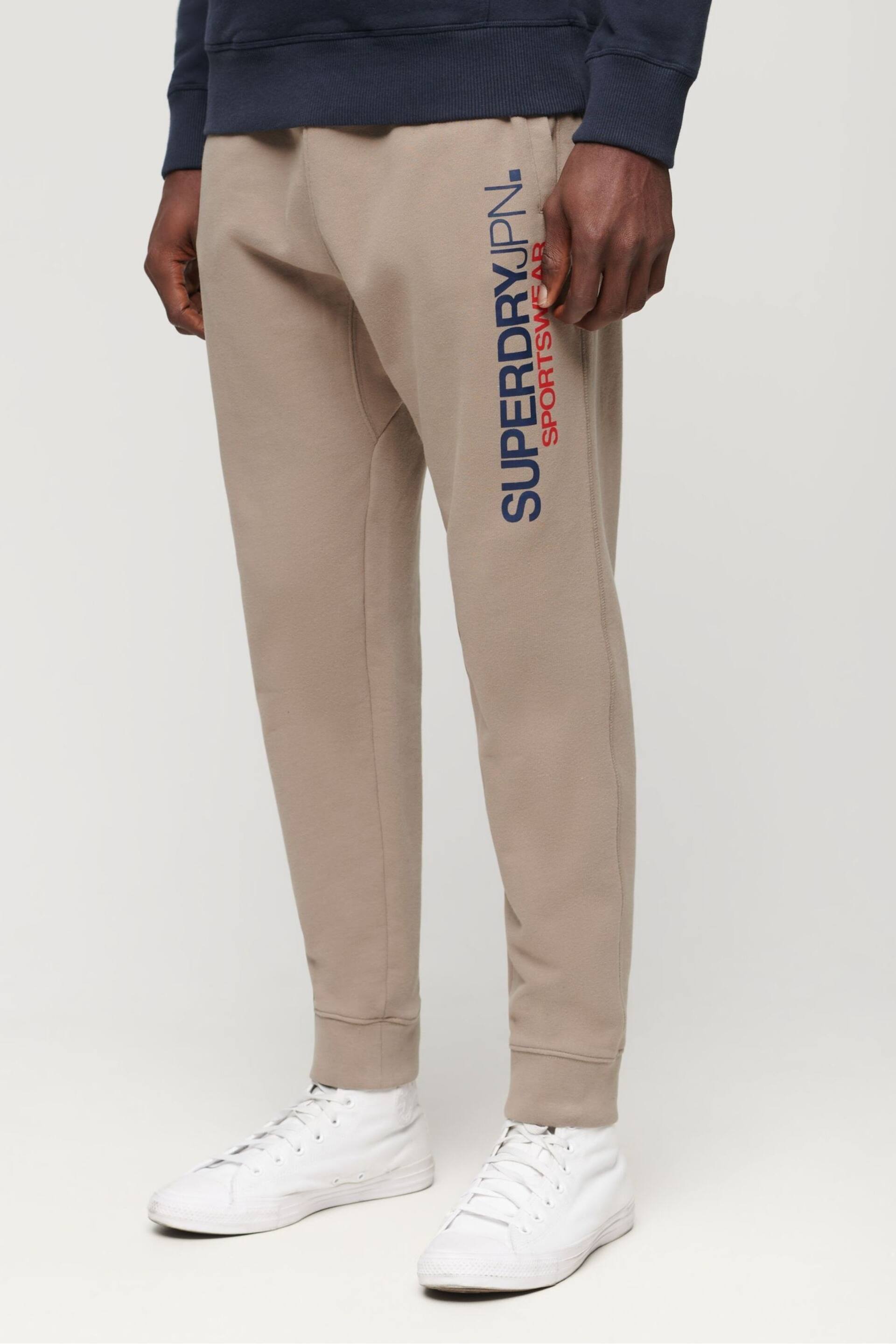 Superdry Nude Sportswear Logo Tapered Joggers - Image 1 of 1