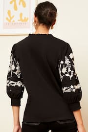 Love & Roses Black V Neck Embroidered Sleeve Jersey Top - Image 2 of 4