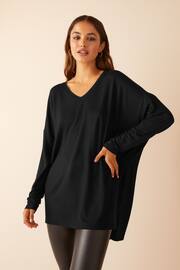 Friends Like These Black Petite Short Sleeve V Neck Tunic Top - Image 1 of 4