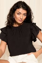 Friends Like These Black Double Ruffle Short Sleeve Top - Image 1 of 4
