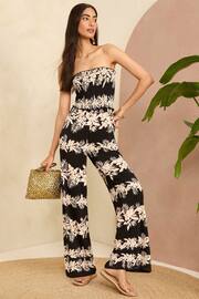 Love & Roses Black and White Floral Shirred Bandeau Wide Leg Jersey Jumpsuit - Image 1 of 4