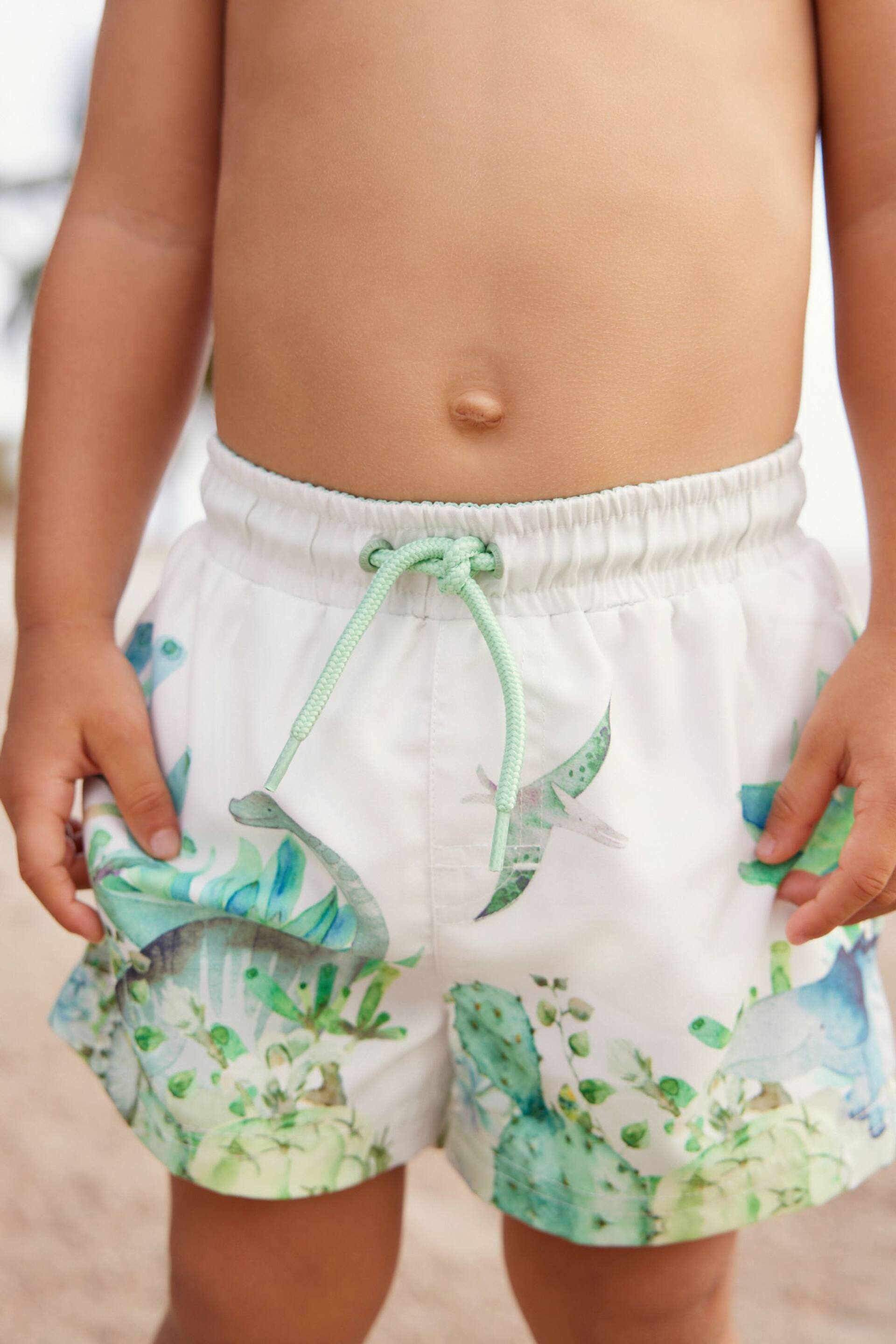 White/Green Printed Swim Shorts (3mths-7yrs) - Image 1 of 7