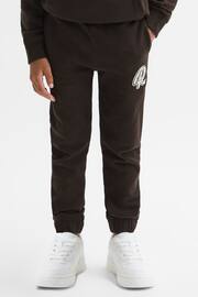 Reiss Chocolate Toby Junior Garment Dyed Logo Joggers - Image 1 of 6