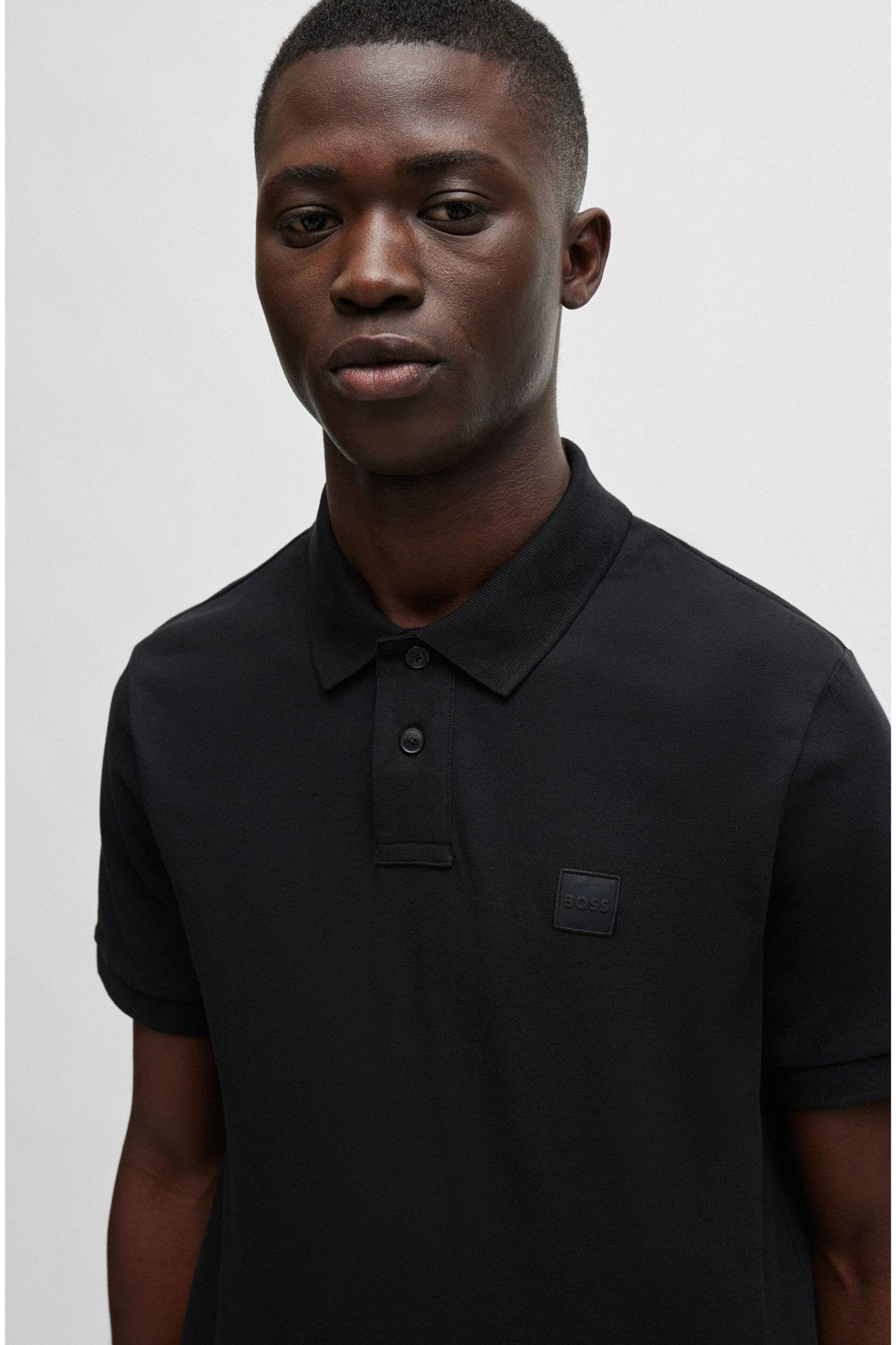 BOSS Black Slim-Fit Logo-Patch Polo Shirt - Image 1 of 5