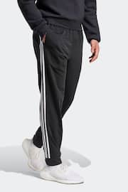 adidas Dark Black Sportswear Essentials Warm Up Tapered 3-Stripes Joggers - Image 3 of 6