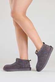 Loungeable Grey Real Sheepskin Mini Boot Slippers - Image 1 of 2